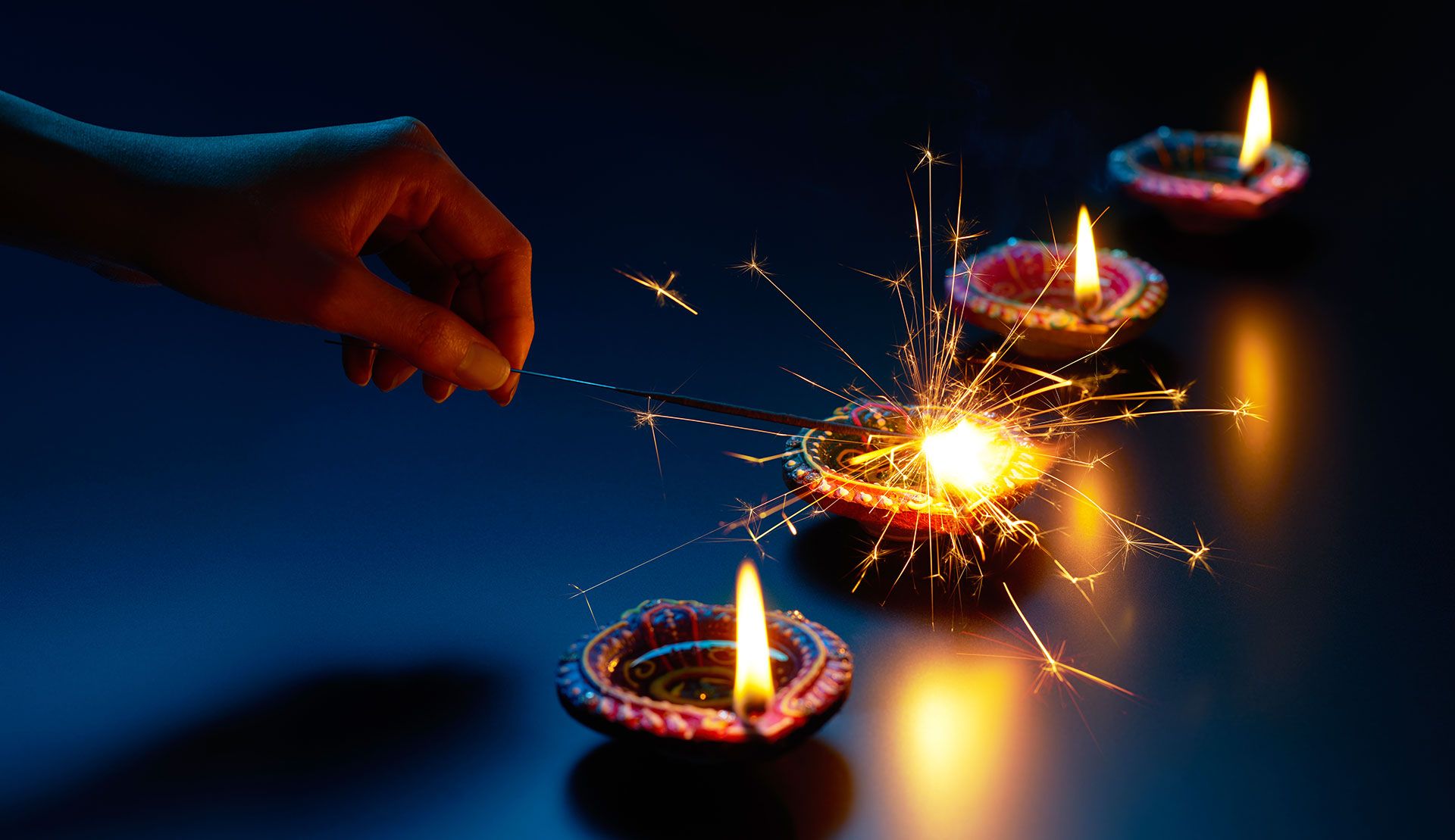 Diwali candles being lit